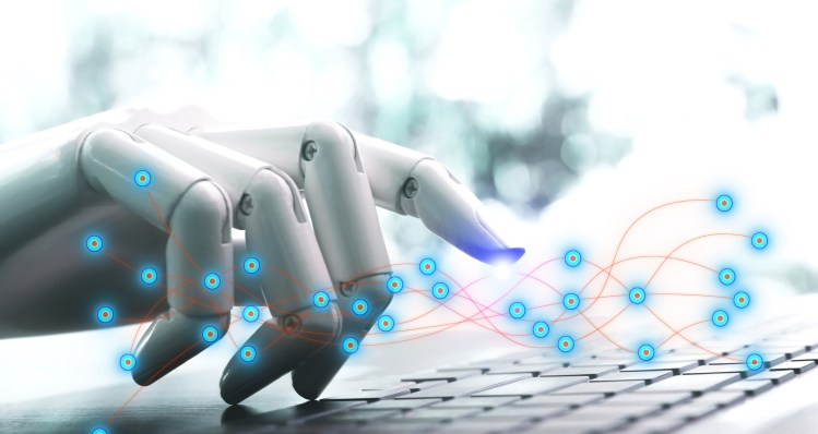 AI content moderation concept: Network technology robot concept or robot hand chatbot pressing computer keyboard enter