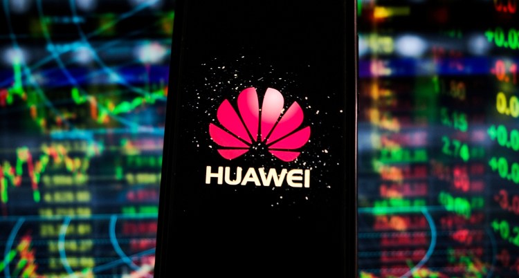 Huawei logo displayed on a smartphone