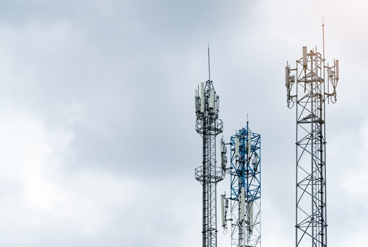 Telecommunication Tower With Gray Sky. Antenna. Radio And Satellite Pole. Communication Technology.
