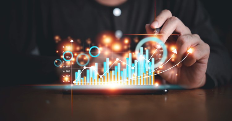 Person touching graph chart and data on digital virtual screen analyze planning business and financial growth up concept.