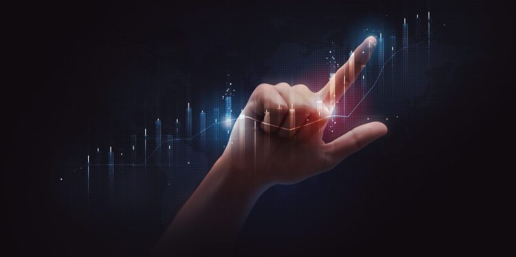 Business person pointing finger to graph in AI and data literacy concept image