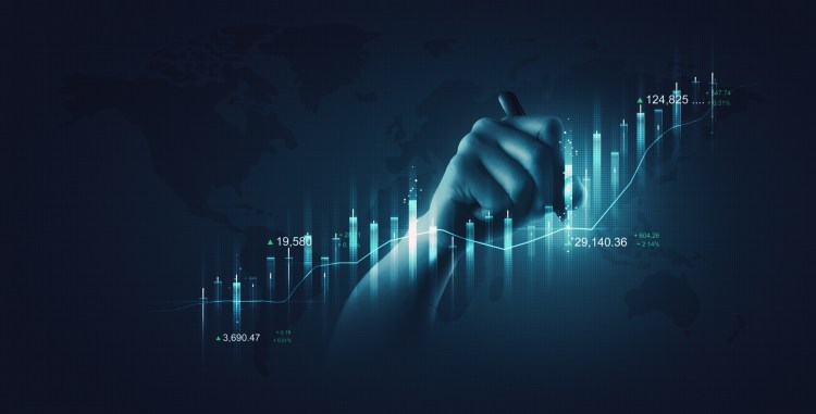 Businessperson holding financial pen chart and writing financial digital investment graph analysis on success background