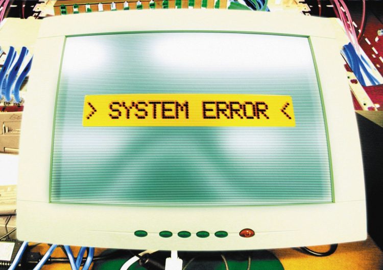 Computer systems error message on screen, digital composite.