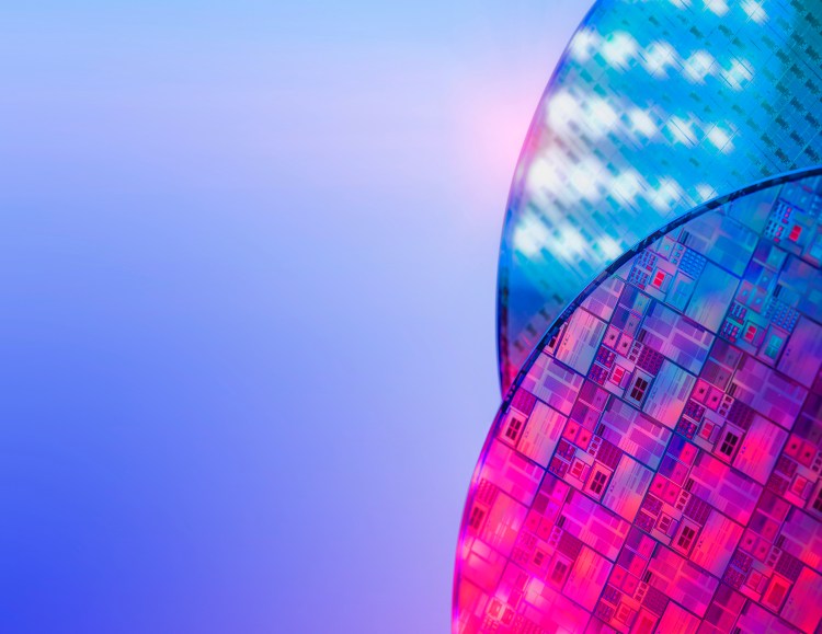 Silicon wafer reflecting different colors.