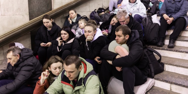Kyiv residents seen at a metro station as they take shelter from Russian air raids.