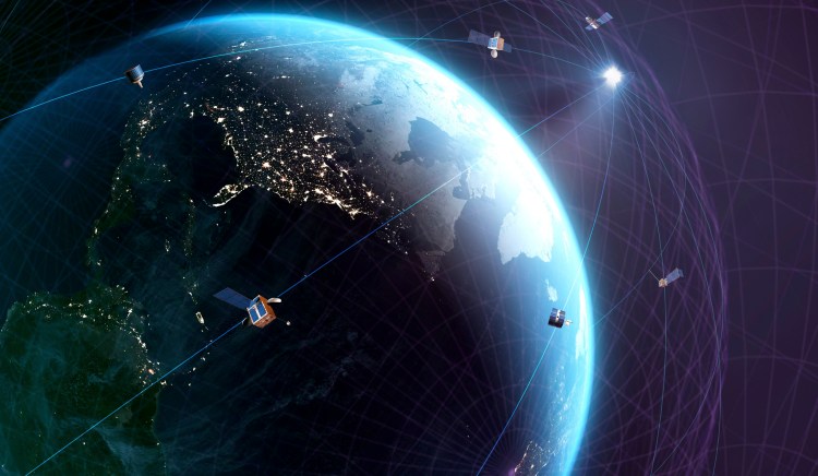 Global satellite communications. Conceptual representation of a global network of communications satellites, such as the Starlink satellites.