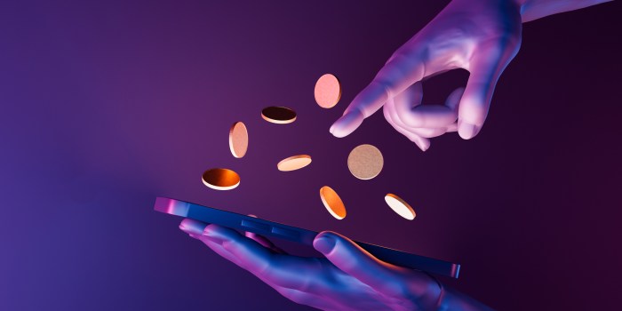 3d hands holding a cell phone with coins on the screen. neon lights. futuristic concept of play to earn, video games, technology, metaverse and crypto.