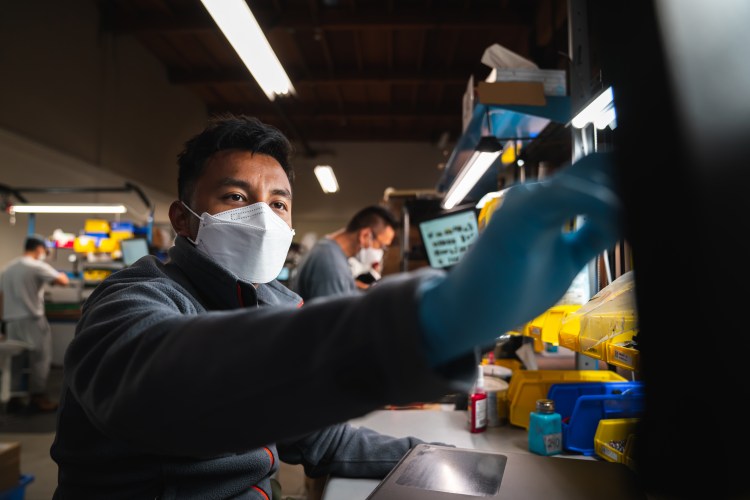 showing man working in a lab