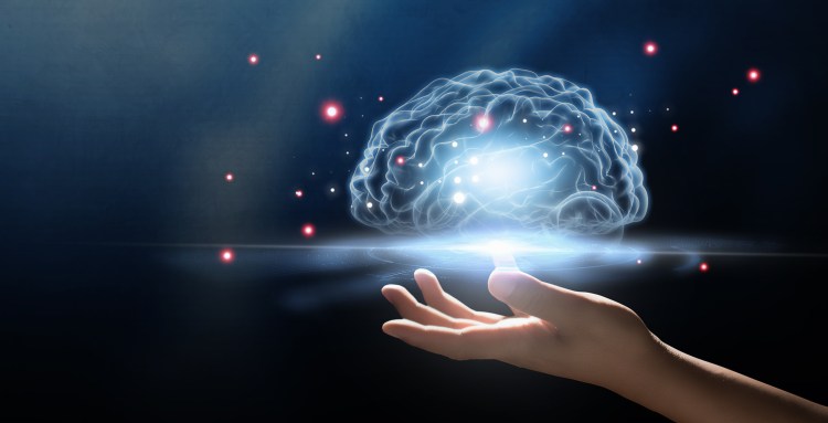 human hand holding brain, Artificial Intelligence, AI Technology, thinking concept.