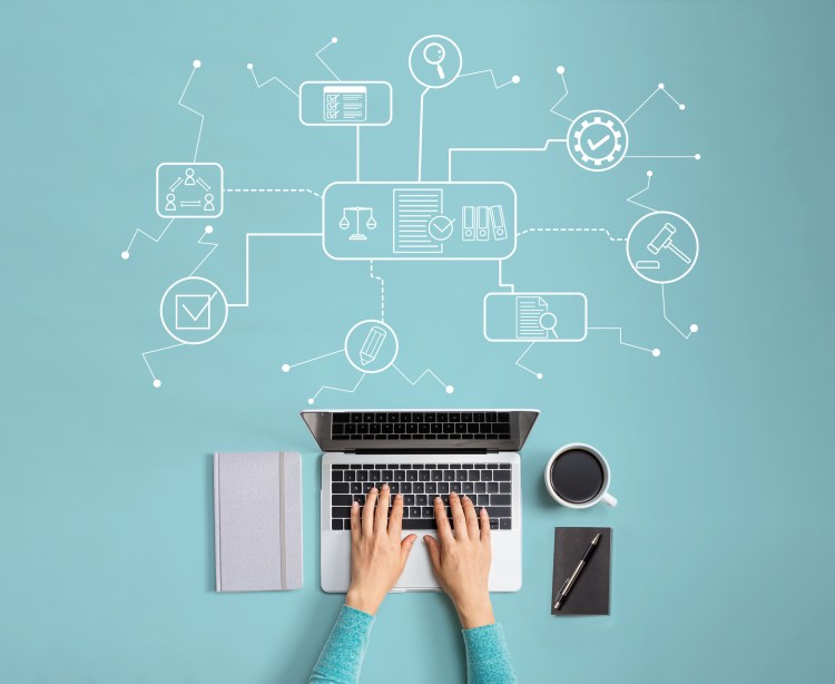 Compliance theme with person using a laptop IT tools, IT inventory