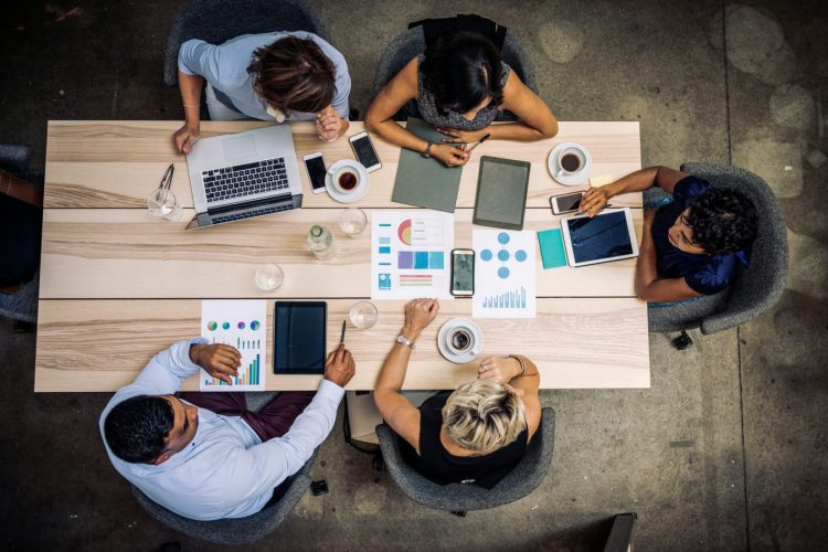 Group of people collaborating on a business project.