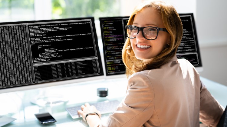 Programmer Woman Coding On Computer. Coder Girl
