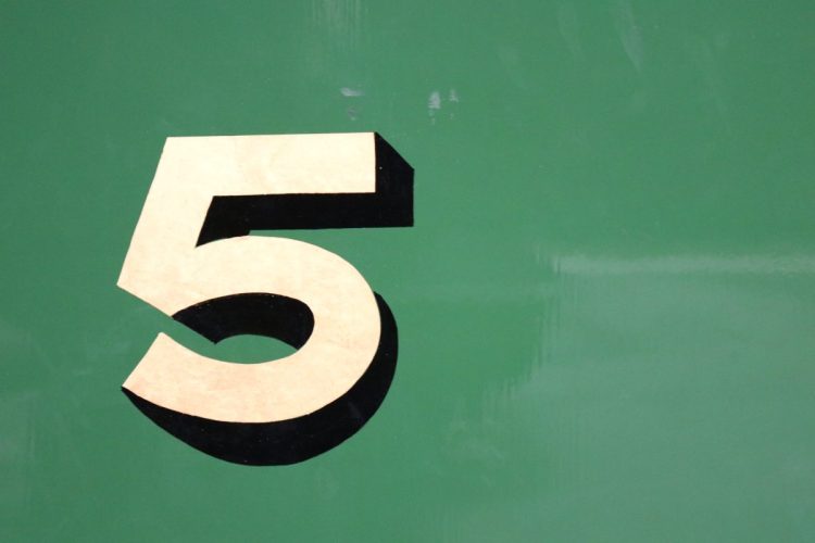 the number 5 against a green background