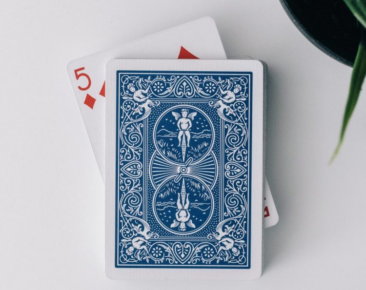 Playing card showing the 5 of diamonds