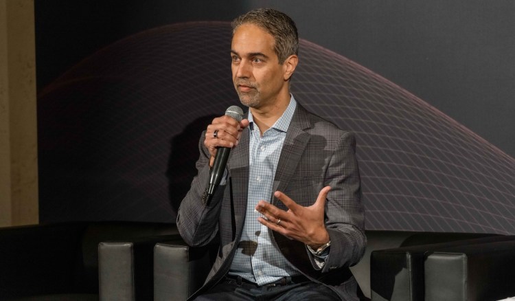 Arjun Dugal, executive vice president, divisional CIO, Card Technology, Capital One shares his insights on how to succeed with AI adoption at scale with the  VB Transform audience. Credit: Louis Columbus/VentureBeat 